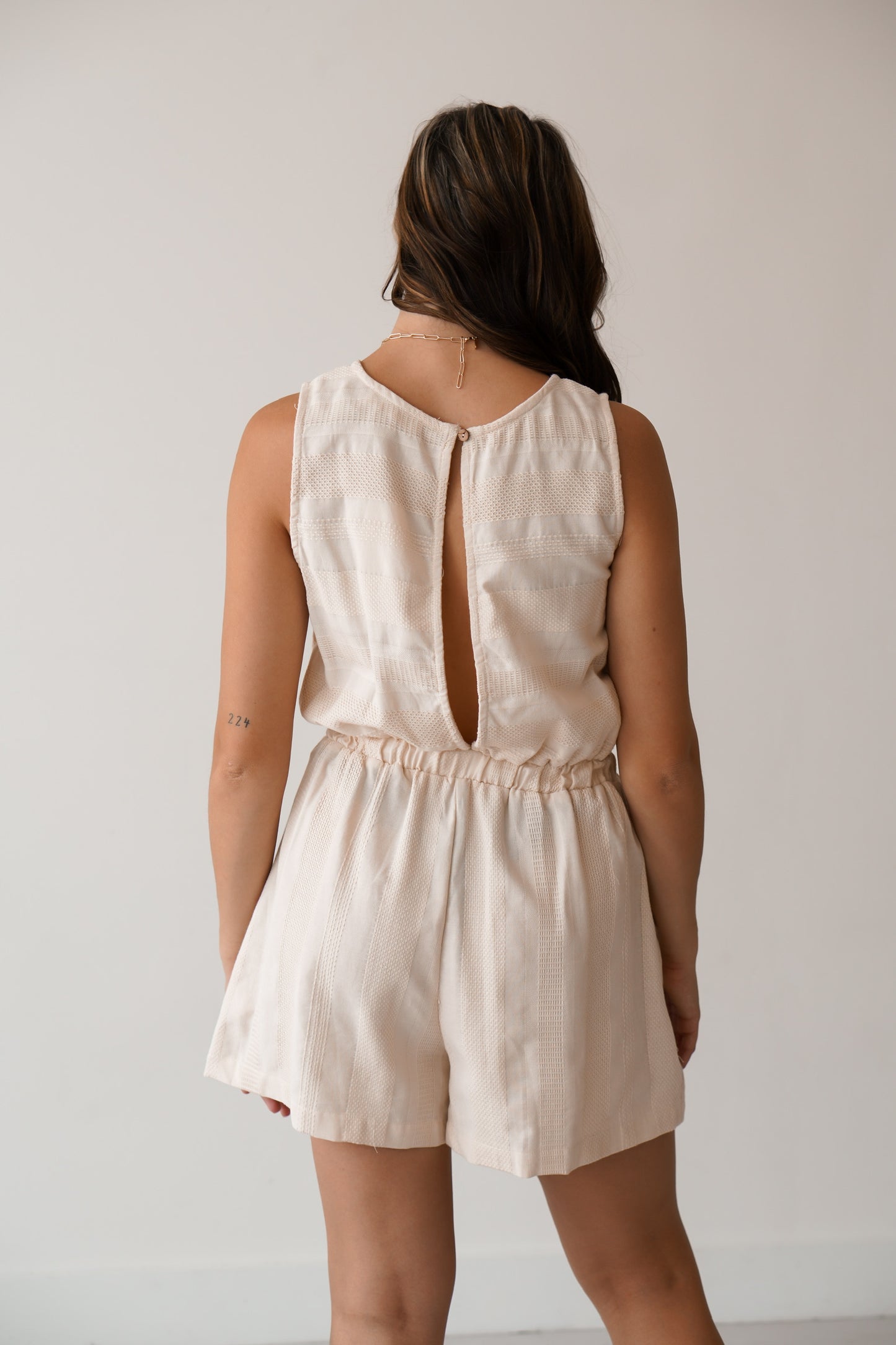 Back of the romper that as somewhat of an open back 