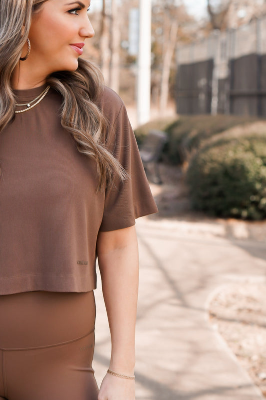 close up picture of brown ribbed cropped tee